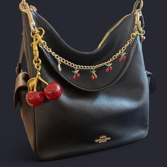 Coach Handbags - Coach Black Leather Shoulder Bag with Gold Accents